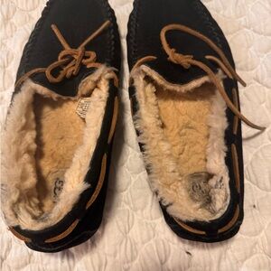 UGG Black and Tan Shearling Moccasins